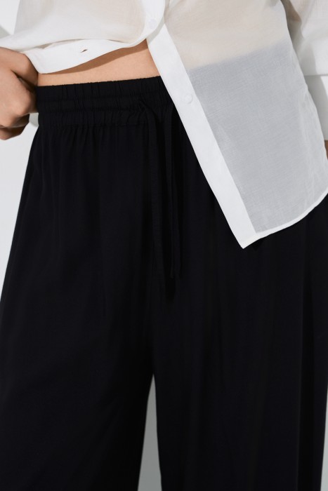 брюки-палаццо из россии вид сбоку