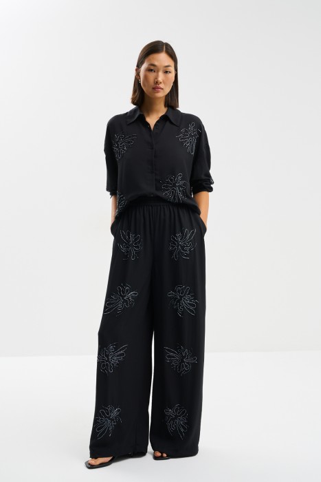 брюки с декором из россии вид сбоку