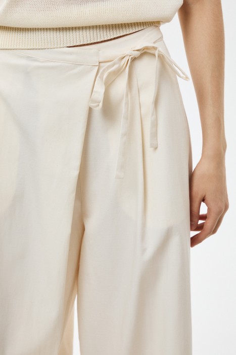 брюки с поясом на завязках из россии вид сбоку