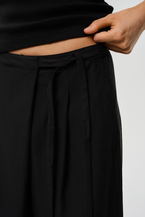 брюки с поясом на завязках из россии вид сбоку