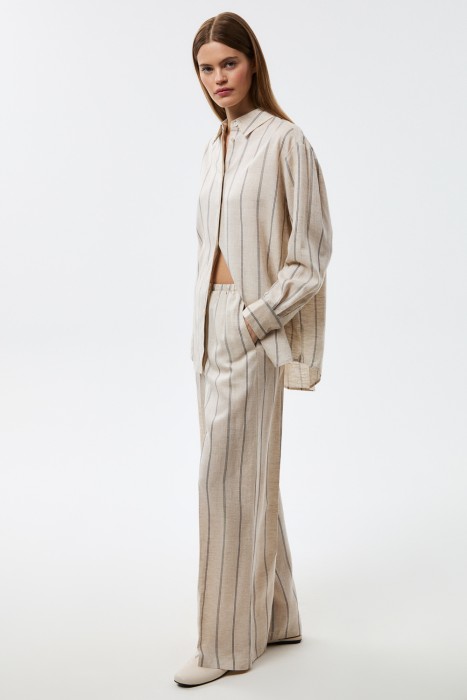 брюки в полоску от бренда снежная королева вид слева