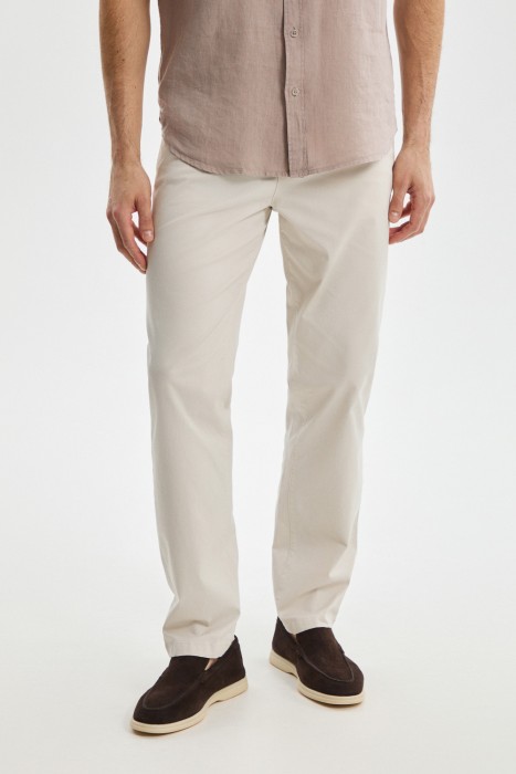 брюки зауженного кроя от бренда снежная королева вид слева