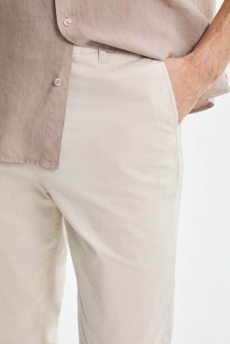 брюки зауженного кроя из россии вид сбоку