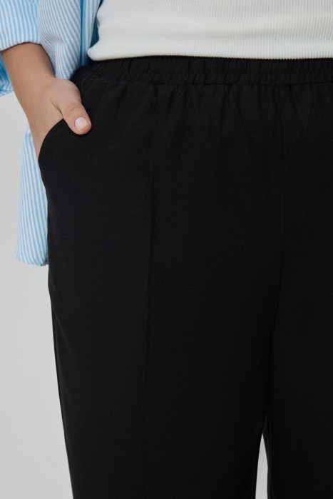 брюки от бренда снежная королева вид слева