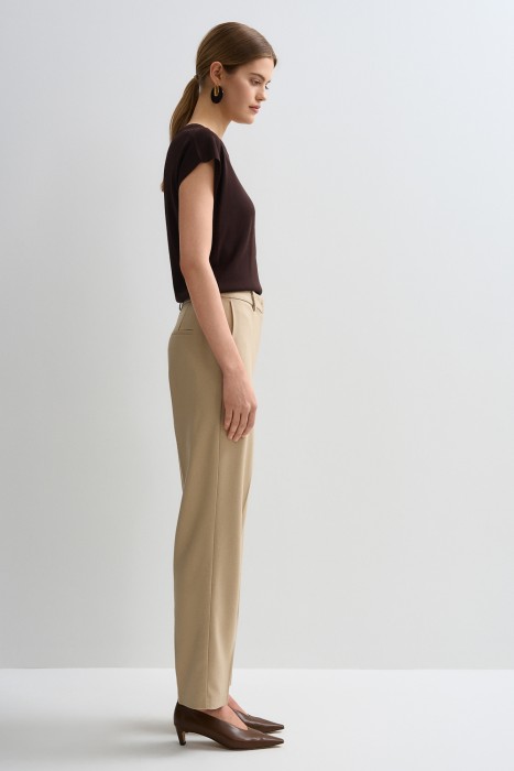 брюки от бренда снежная королева вид слева