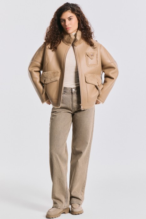 дубленка из искусственной кожи и натуральной шерсти от бренда снежная королева вид слева