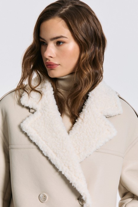 дубленка из искусственной кожи и натуральной шерсти от бренда снежная королева вид слева