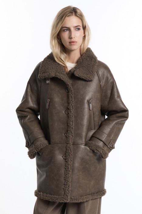 дубленка из искусственной кожи с отделкой шерстью из россии вид сбоку
