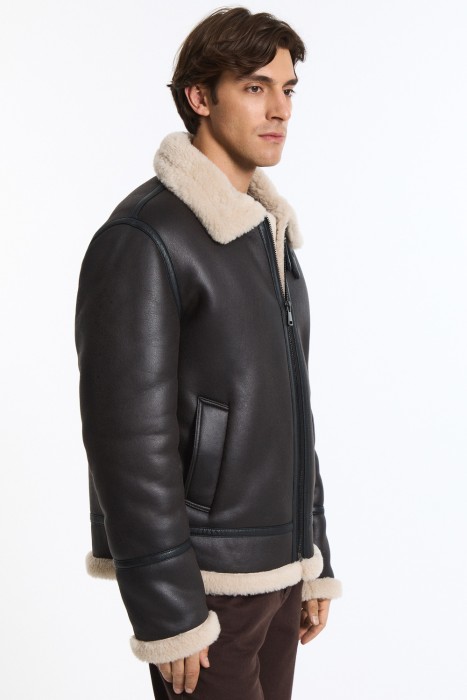 дубленка из искусственной кожи от бренда снежная королева вид слева