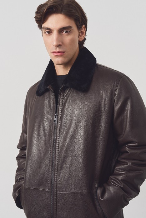 дубленка из овчины и натуральной кожи от бренда снежная королева вид слева