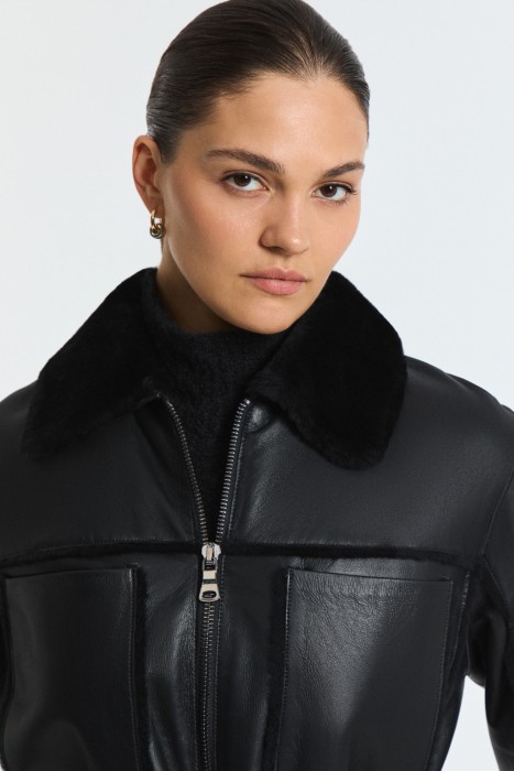 дубленка из овчины с поясом из россии вид сбоку