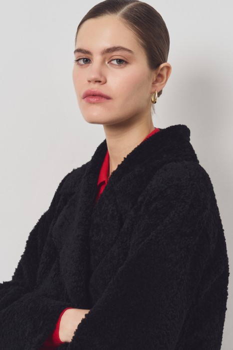 дубленка из овчины с ремнем из россии вид сбоку