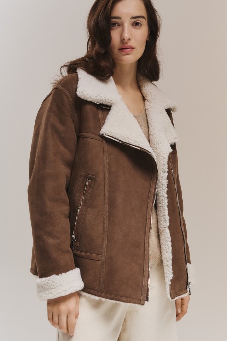 дубленка из овчины от бренда снежная королева вид слева