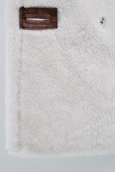 дубленка из овчины от бренда снежная королева вид слева