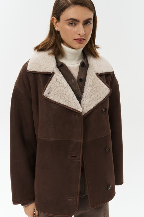 дубленка из овчины от бренда снежная королева вид слева