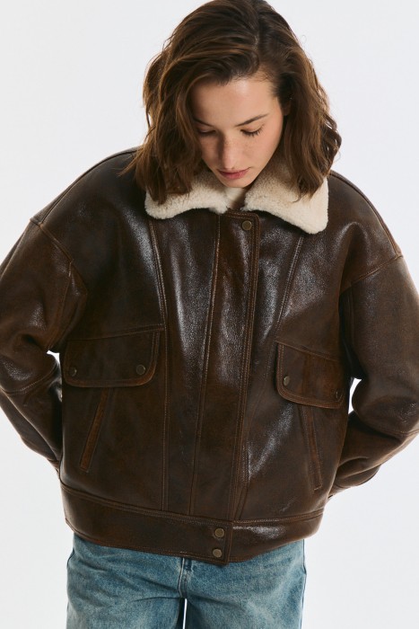 дубленка из овчины от бренда снежная королева вид слева