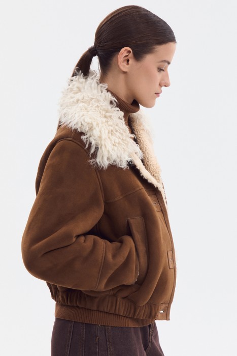 дубленка из овчины от бренда снежная королева вид слева