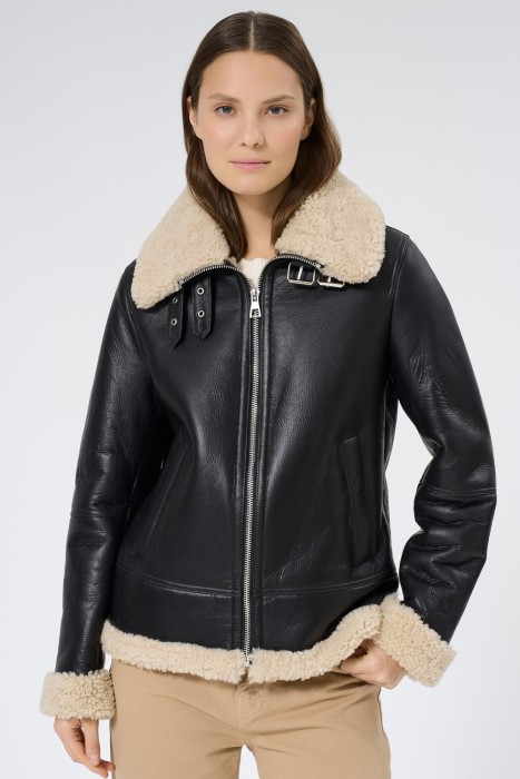 дубленка из овчины от бренда снежная королева вид слева