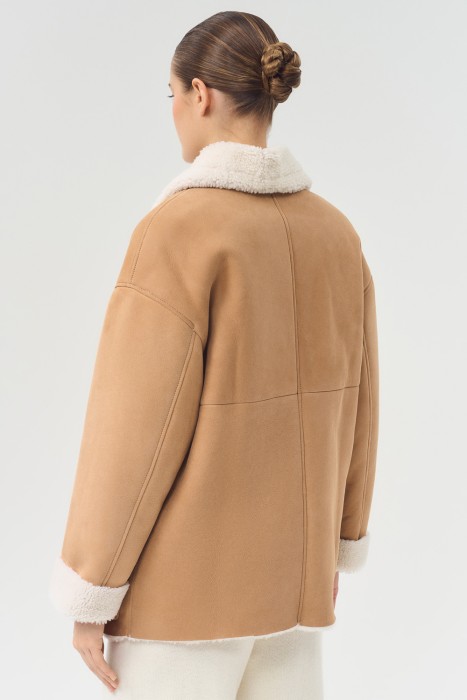 дубленка из овчины от бренда снежная королева вид слева