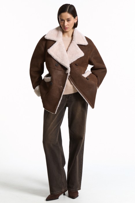 дубленка из овчины от бренда снежная королева вид слева