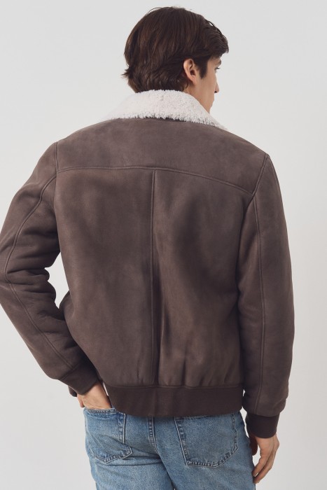 дубленка из овчины от бренда снежная королева вид слева