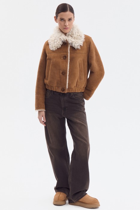 дубленка из овчины от бренда снежная королева вид слева