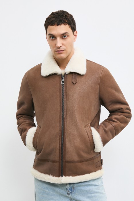 дубленка из овчины от бренда снежная королева вид слева