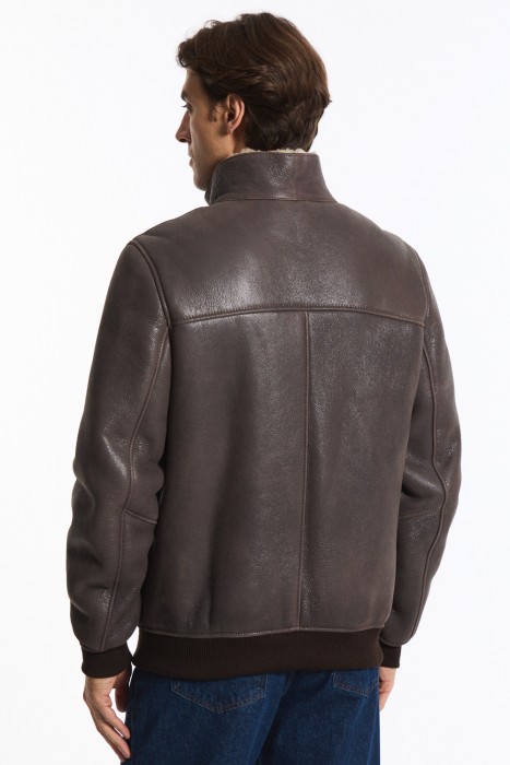 дубленка из овчины от бренда снежная королева вид слева