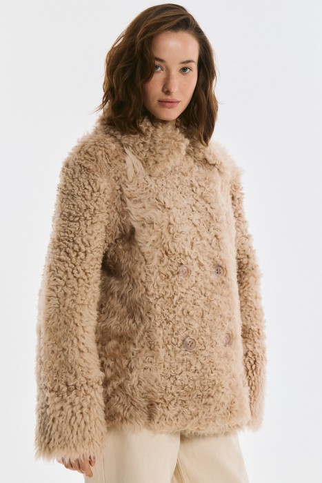 дубленка из овчины от бренда снежная королева вид слева