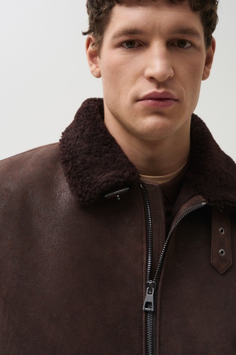 дубленка из овчины от бренда снежная королева вид слева