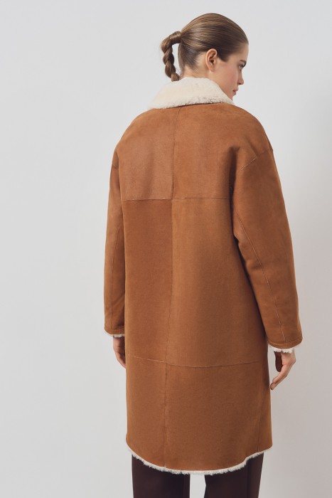 дубленка из овчины от бренда снежная королева вид слева