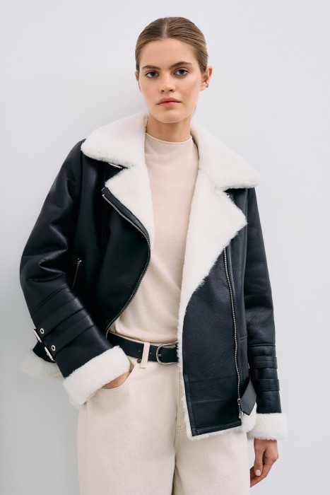 дубленка-косуха из овчины от бренда снежная королева вид слева