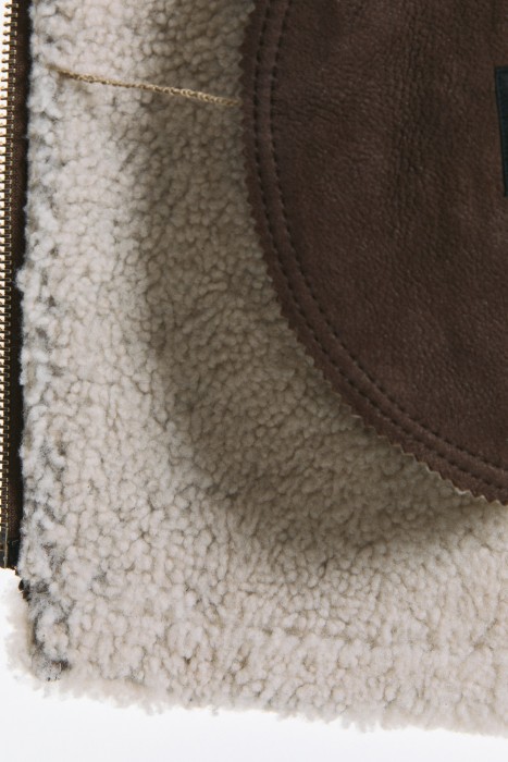 дубленка-косуха из овчины из россии вид сбоку