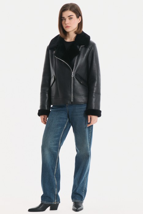 дубленка-косуха из овчины от бренда снежная королева вид слева