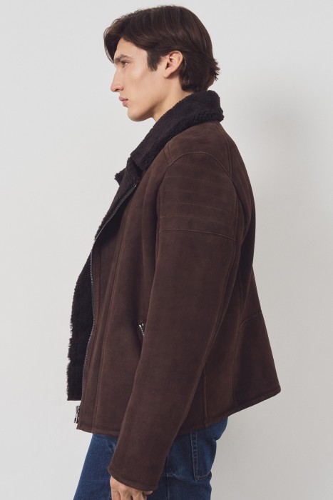 дубленка-косуха из овчины от бренда снежная королева вид слева