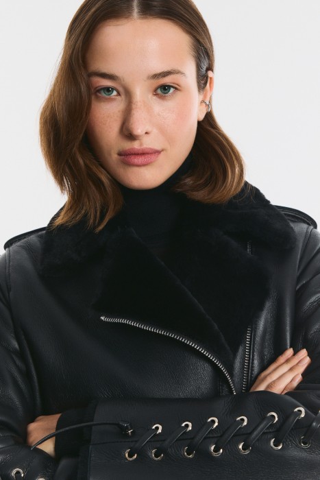 дубленка-косуха из овчины от бренда снежная королева вид слева