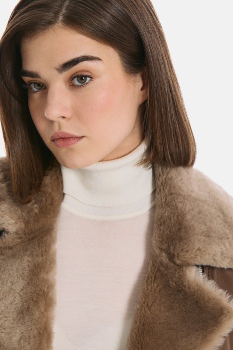 дубленка-косуха из овчины из россии вид сбоку