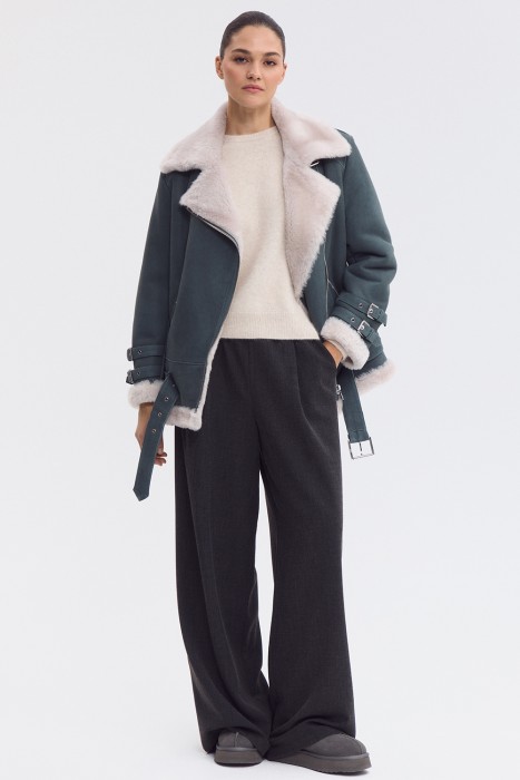 дубленка-косуха из овчины от бренда снежная королева вид слева