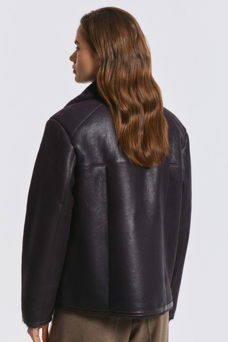 дубленка-косуха из овчины от бренда снежная королева вид слева