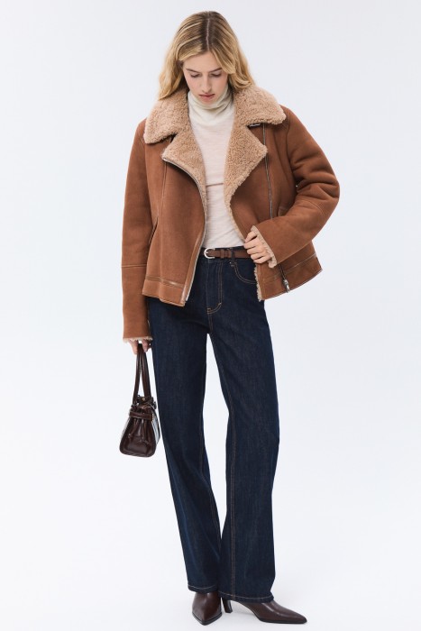 дубленка-косуха из овчины от бренда снежная королева вид слева