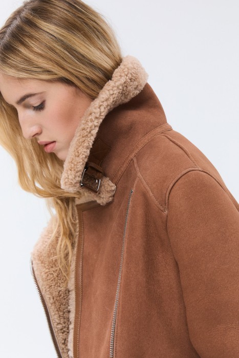 дубленка-косуха из овчины из россии вид сбоку