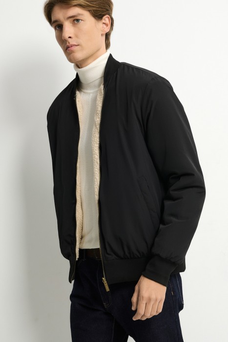 двухсторонняя куртка от бренда снежная королева вид слева