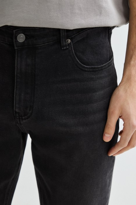 джинсы зауженные из россии вид сбоку