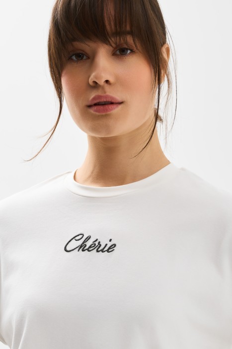 футболка с надписью от бренда снежная королева вид слева