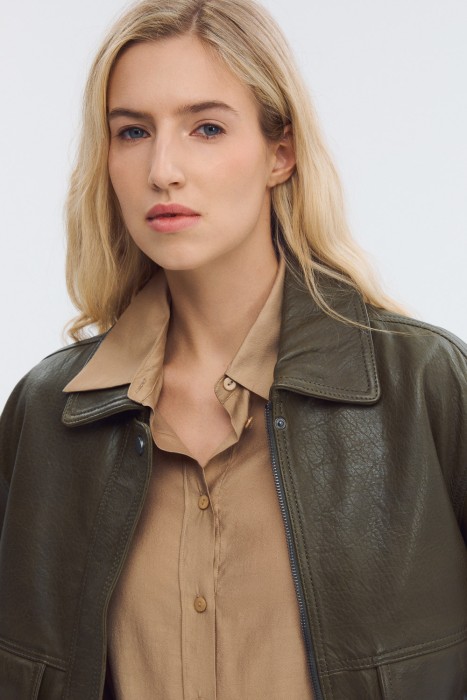 куртка из натуральной кожи от бренда снежная королева вид слева