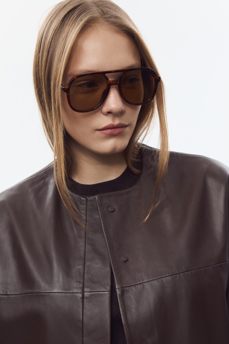 куртка из натуральной кожи из россии вид сбоку