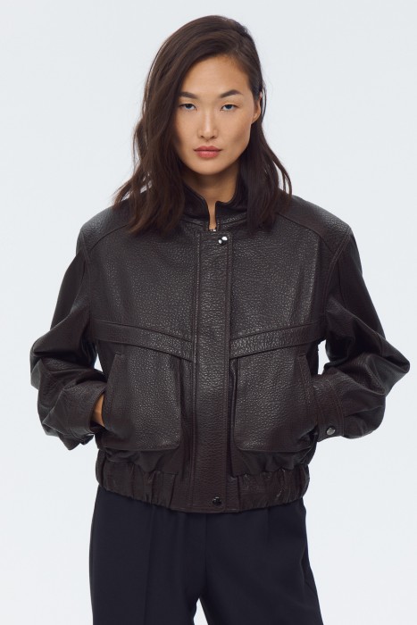 куртка из натуральной кожи от бренда снежная королева вид слева