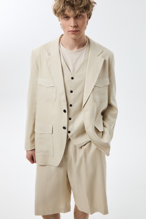 пиджак от бренда снежная королева вид слева