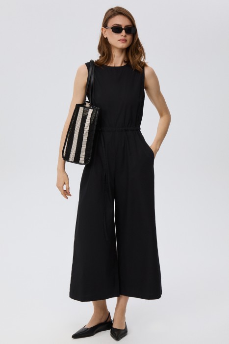 плетеная сумка из текстиля от бренда снежная королева вид слева