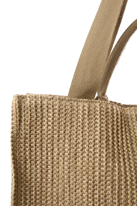 плетеная сумка из текстиля от бренда снежная королева вид слева